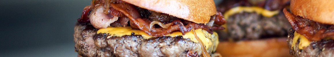 Eating American (Traditional) Burger at Yogurtz Grill restaurant in Meridian, ID.